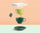 Conceptual illustration showing Zinus mattress comfort inspired by green tea, with layered elements stacked like a teacup arrangement, conveying soothing support, infused materials, and a calm, refreshing sleep experience
