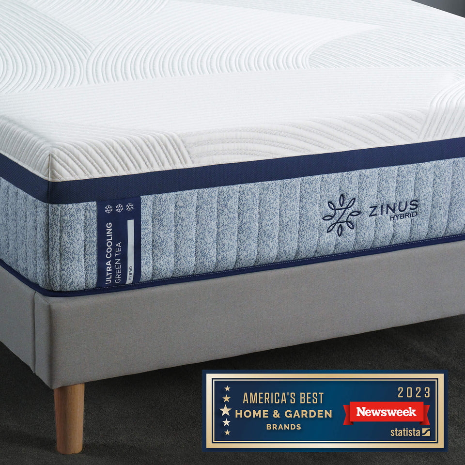 Close-up of Zinus Ultra Cooling Green Tea Hybrid Mattress on platform bed. Cooling gel memory foam and coils provide comfort and support. Recognized as America’s Best Home & Garden Brand 2023 by Newsweek for quality sleep solutions.