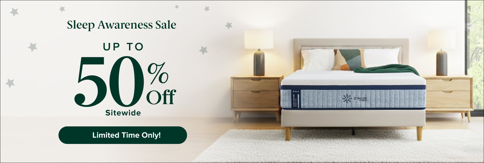 Sleep Awareness Sale promotion with text “Up to 50% Off Sitewide” and “Limited Time Only,” shown beside a Zinus hybrid mattress on a light upholstered platform bed in a bright modern bedroom with wood nightstands, table lamps, and neutral decor.