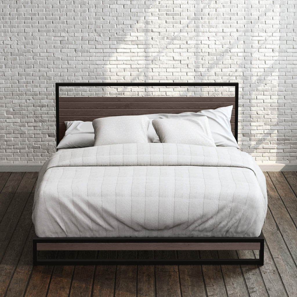 Zinus Suzanne Metal and Bamboo Platform Bed Frame styled with neutral bedding in a modern loft bedroom. Features bamboo headboard and footboard with black steel frame, combining durability, strong mattress support, and industrial style. 
