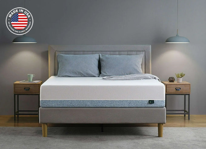 Zinus Cooling mattress on upholstered bed with gray headboard, styled with twin nightstands and pendant lamps; includes 'Made in USA' badge