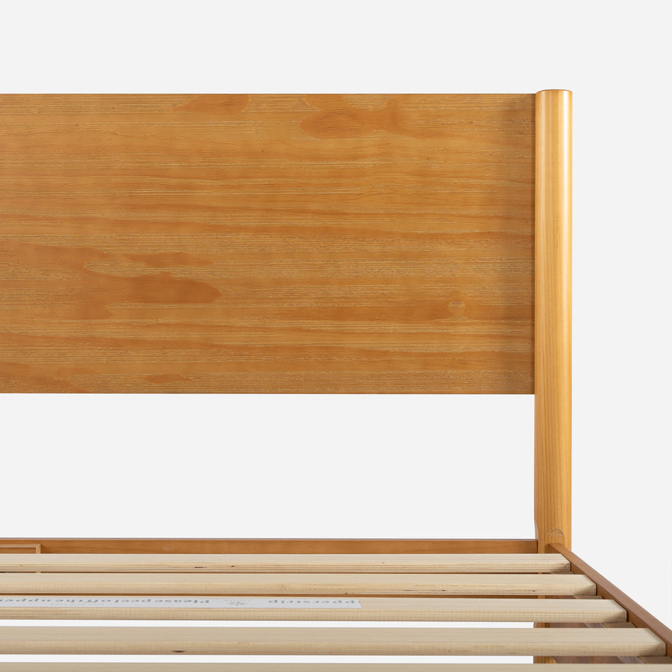 Headboard view of Zinus Allen Wood Platform Bed Frame in rich natural finish. Sleek, minimalist panel design highlights smooth wood grain and sturdy craftsmanship. Wooden slat foundation adds durability and support, combining timeless appeal with functional modern style